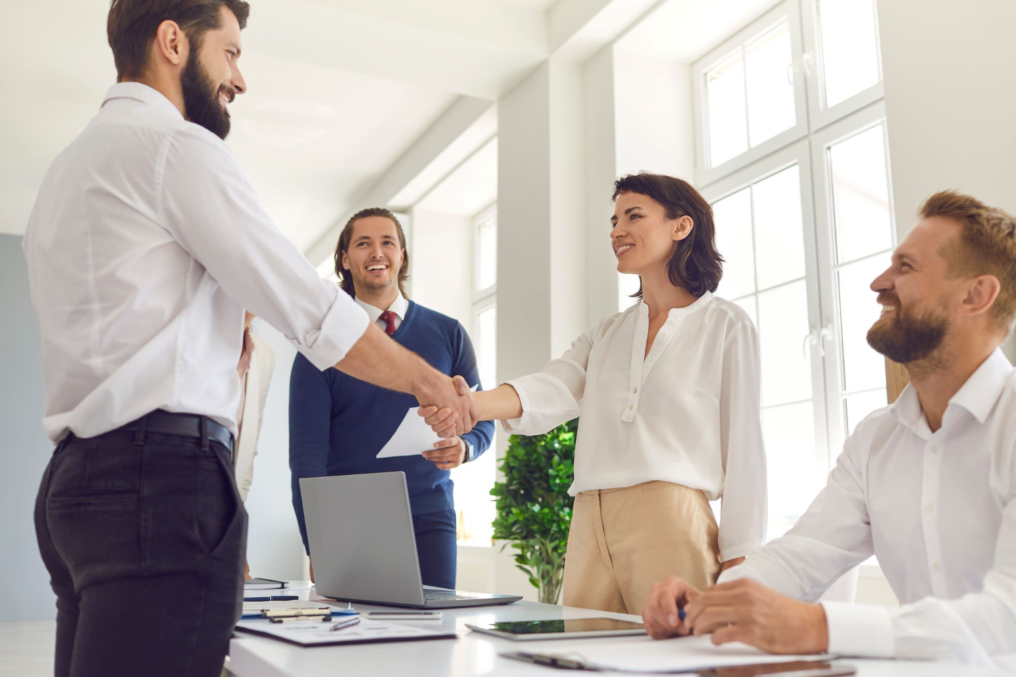 happy applicant shaking hands